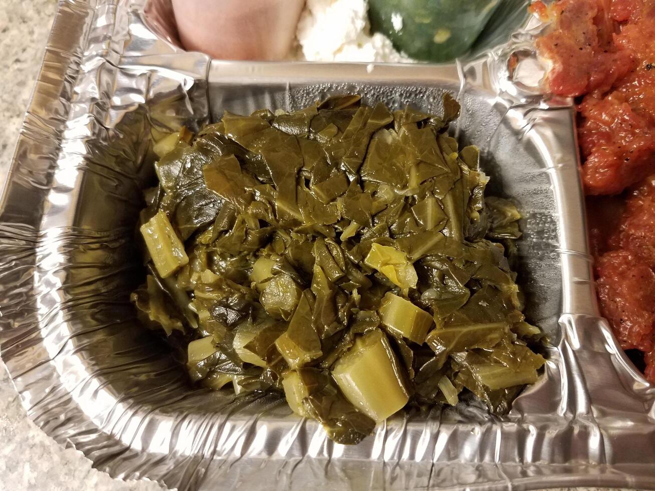 delicious Ethiopian collard greens called gomen in container 14259749