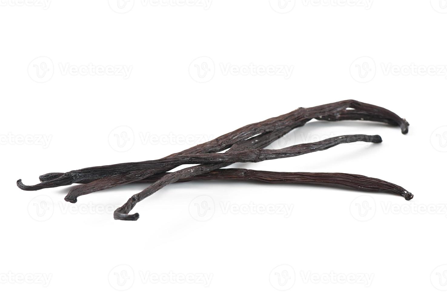 Sticks of vanilla isolated on white background photo