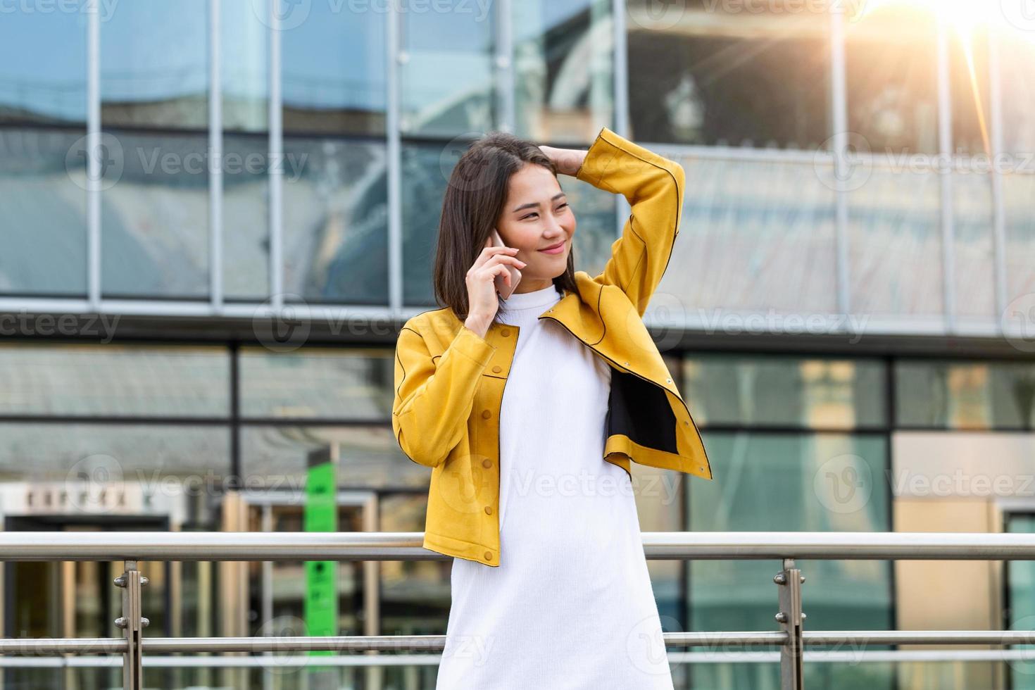 Businesswoman in formal wear having trouble with contracts talking on the phone. Businesswoman angry abount about paperwork failure at workplace, executives having conflict photo