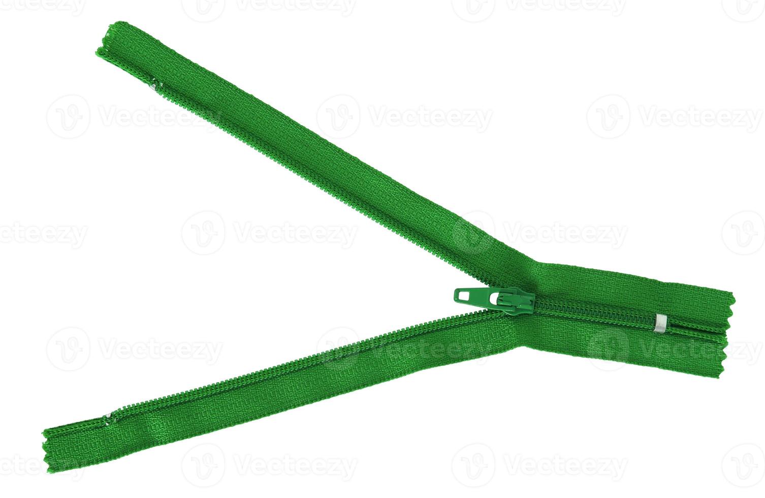 green zipper isolated on white with clipping path photo