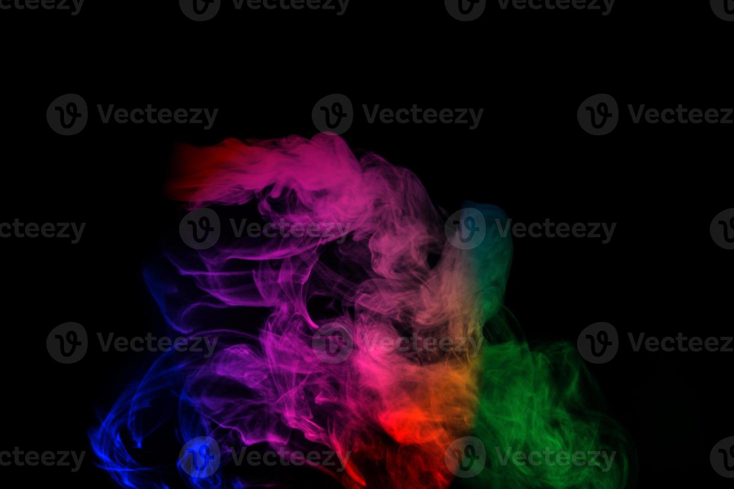 Abstract smoke isolated on black background,Rainbow powder photo