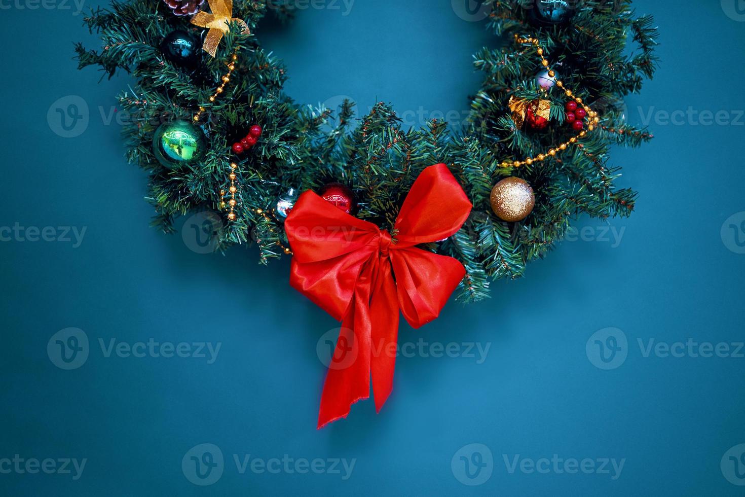 Christmas decorations wreath on wall. photo