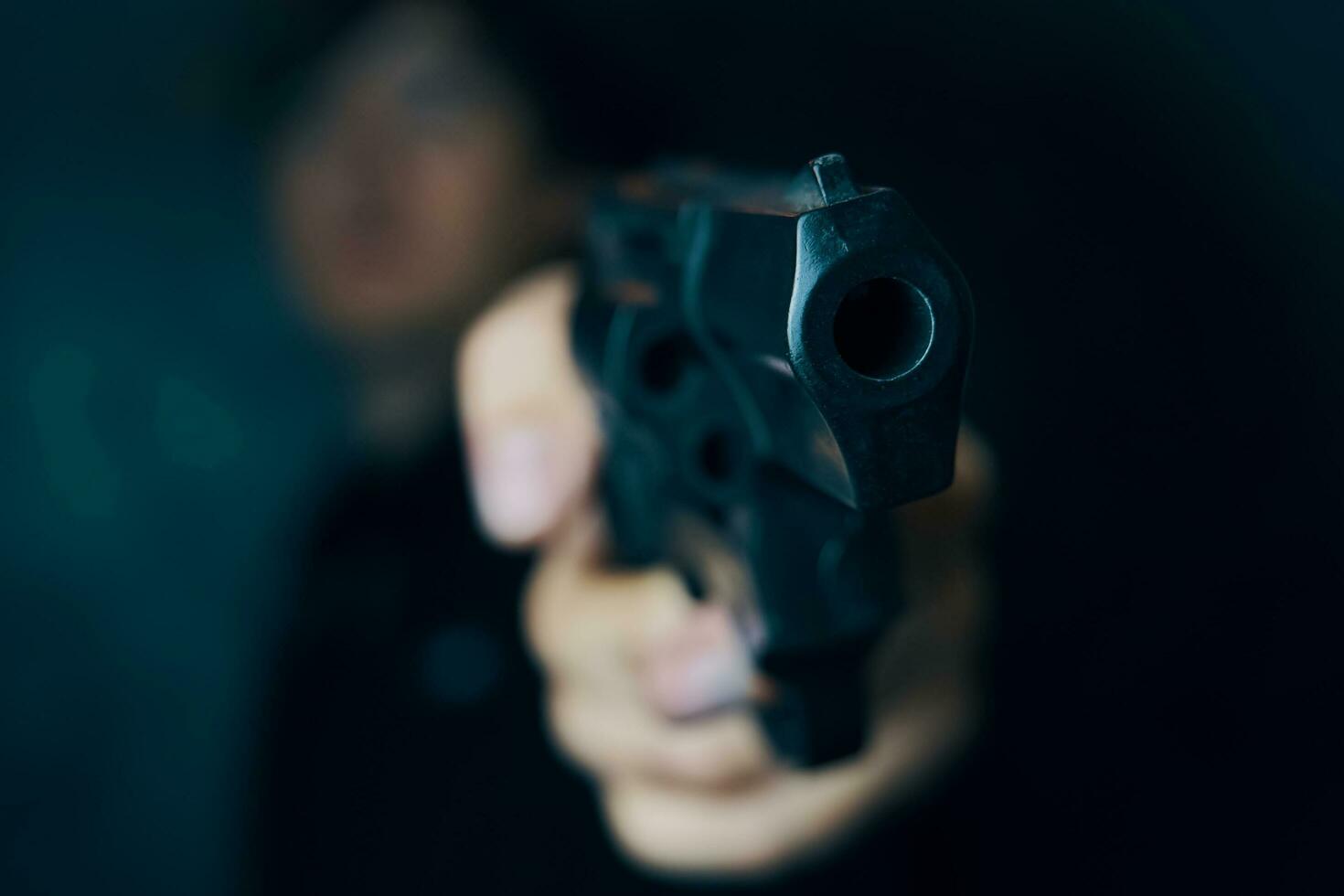 Firearm in man's hand. photo