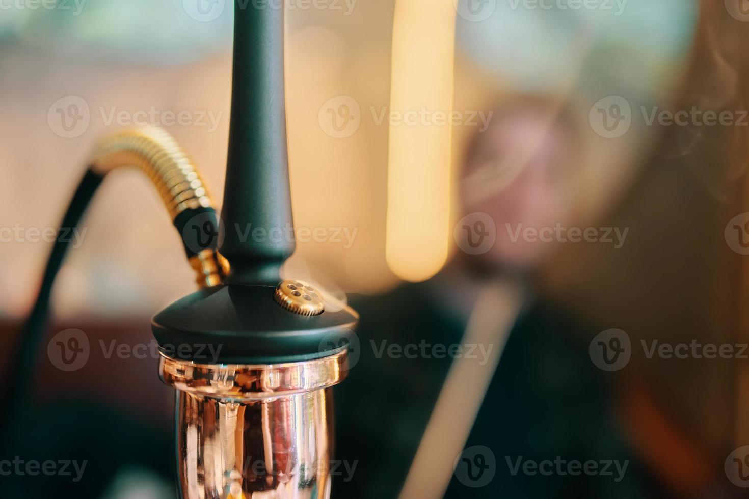 Hookah on table in lounge bar. photo