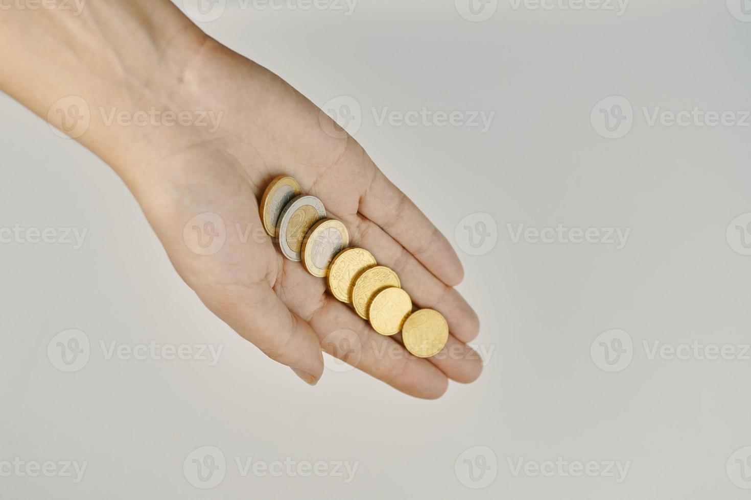 Coins in person's hands. photo