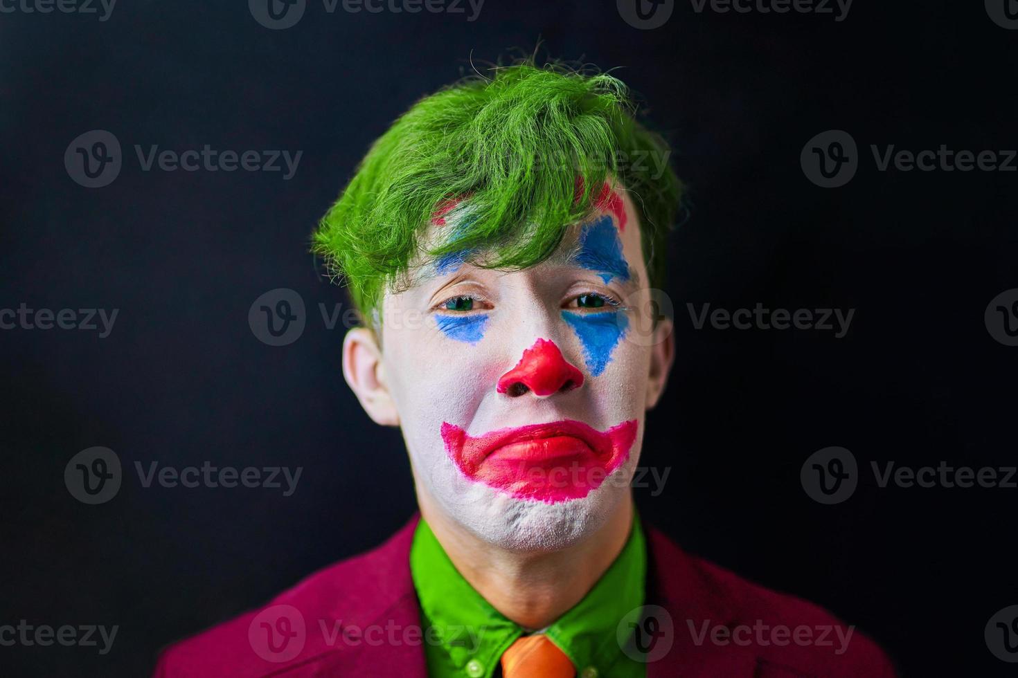 Man in clown makeup photo