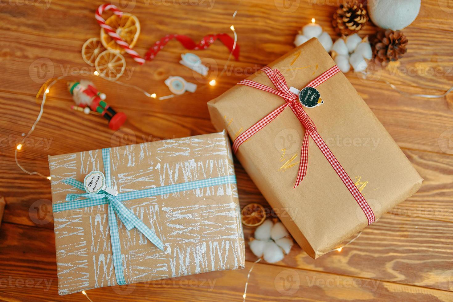 Gift box on wooden table. photo