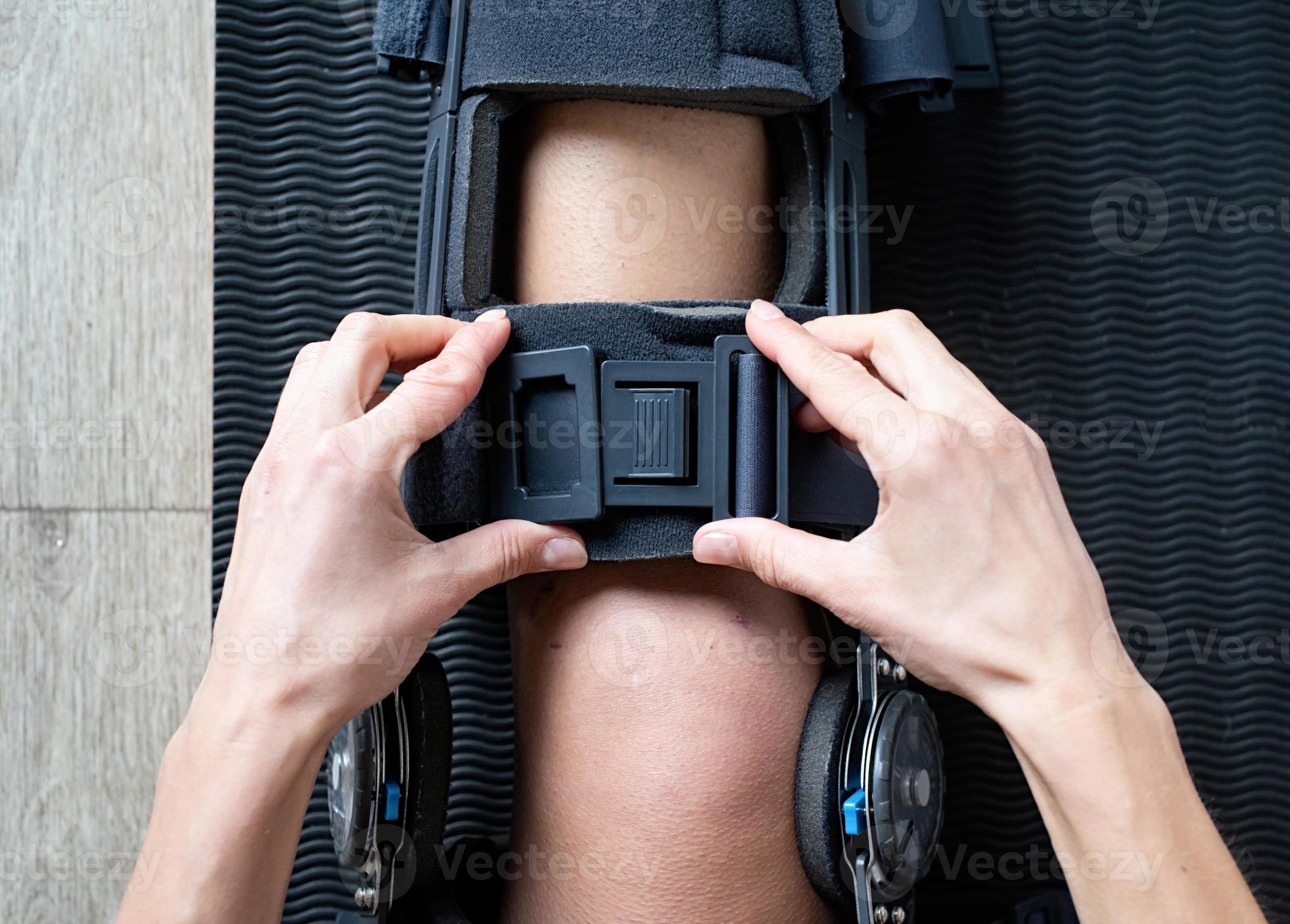 Female buckling knee orthosis or knee support brace after surgery on