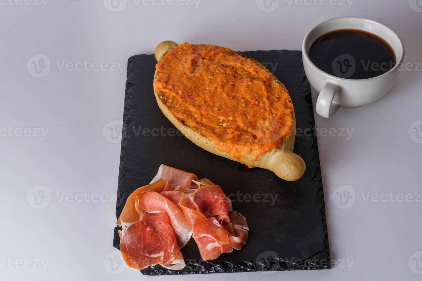 slice-of-bread-with-tomato-iberian-ham-and-a-cup-of-coffee-typical