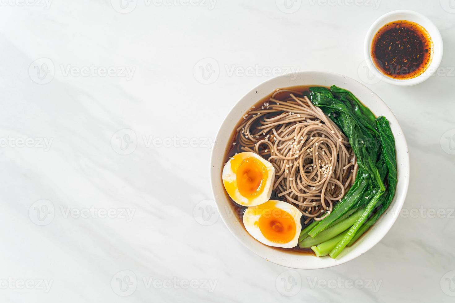 ramen noodles with egg - vegan or vegetarian food style photo