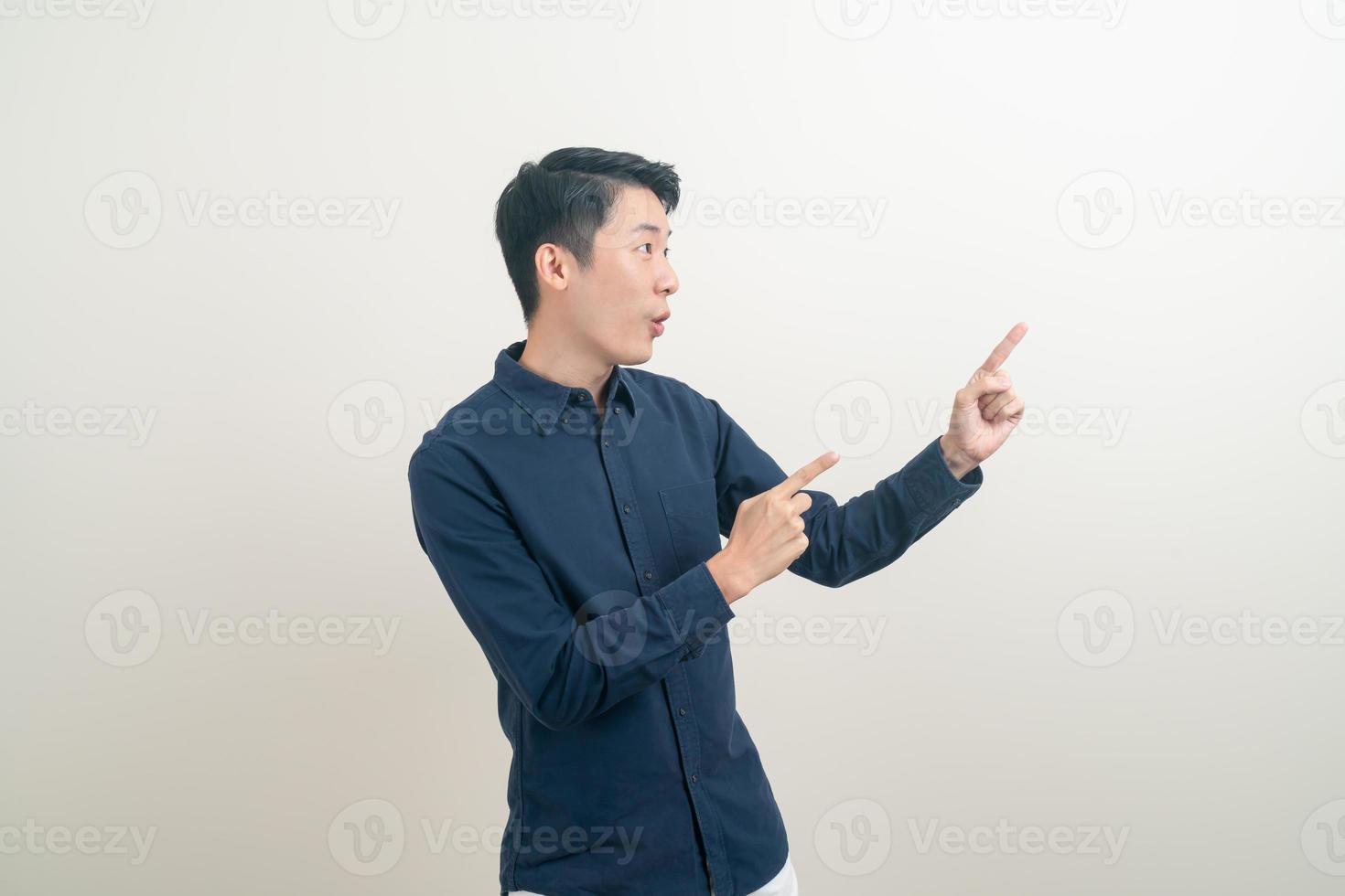 Asian man with hand pointing or presenting on white background photo