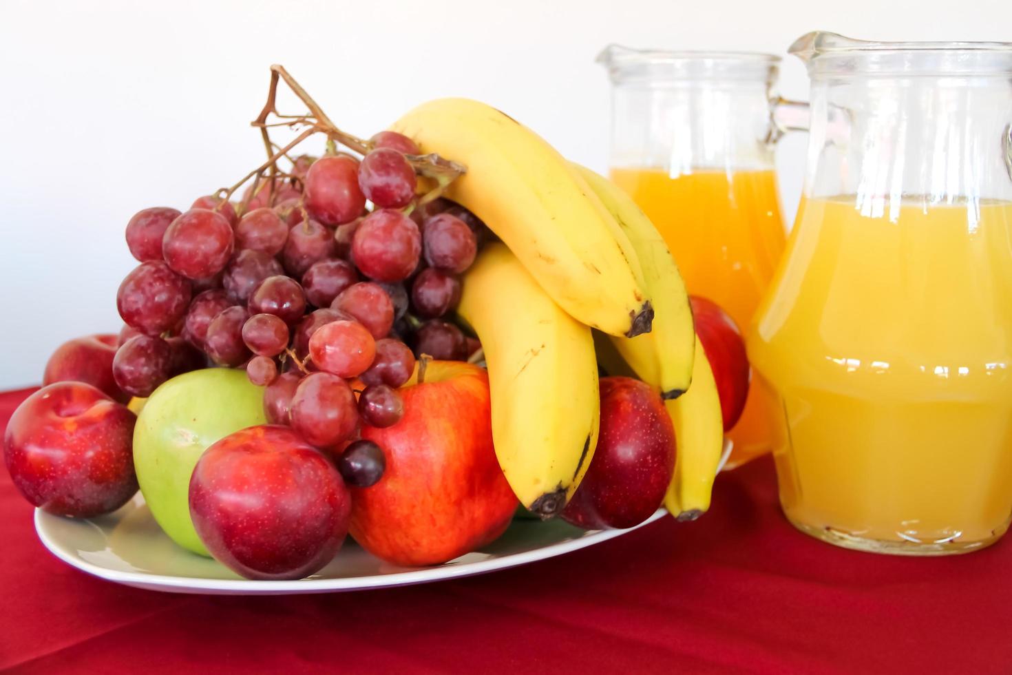 variety of fresh fruits served on a plate photo