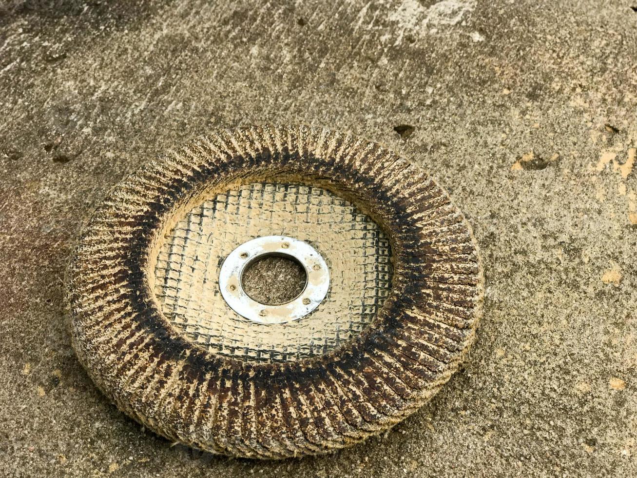 disk circle used broken for grinding machine for power tools for grinding and polishing surfaces from various materials wood, metal, plastic, stone photo