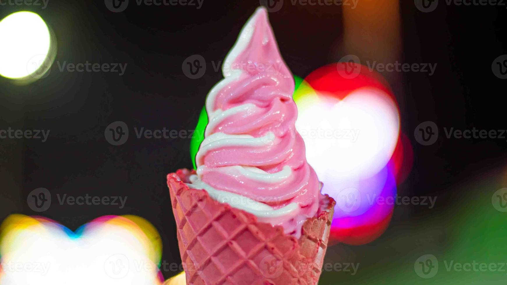 Eat ice cream at night in the light bokeh light 14262082 Stock Photo at