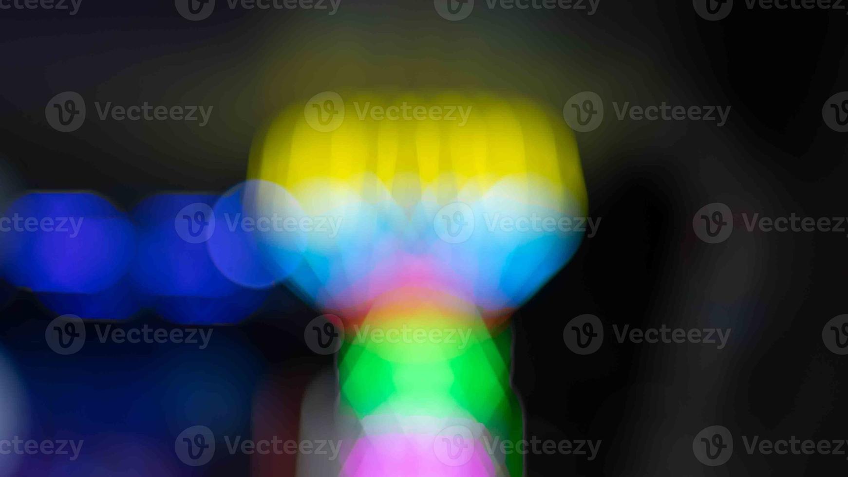 The whole bokeh image shows the yellow light in a flash. as wallpaper Focus on blurring the entire image to create bokeh of light photo