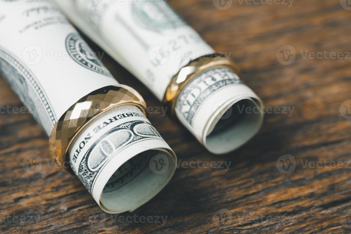 Save money and planning wedding concept. Sustainable financial goal for family life or married life. Rings with stack of coins, saving money for marry, depicts savings or growth for new family. photo