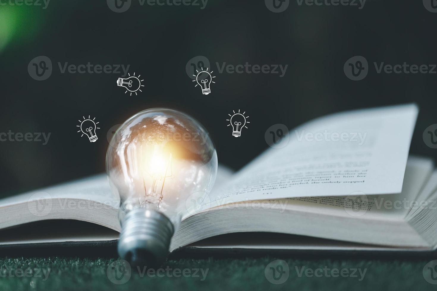 Bright light bulb and icon with book. Business success idea and education or learning online concept. Business person achievement and inspiration. technology, Create Imagination for Inspiration. photo