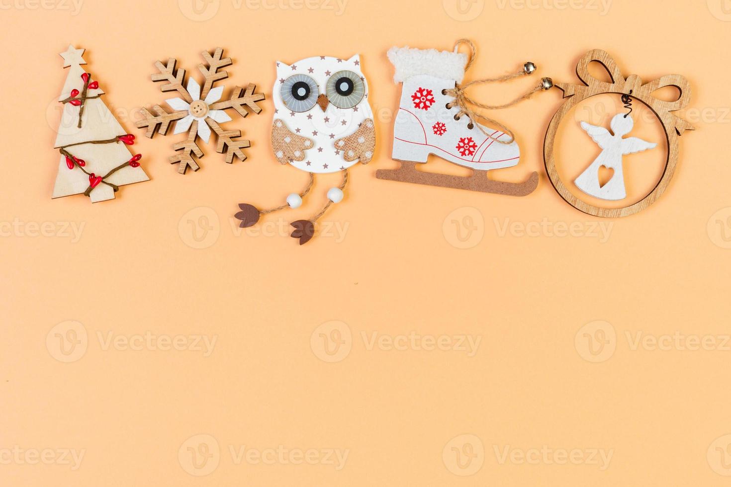Top view of holiday ornament made of Christmas decorations on colorful background. New Year time concept with copy space photo