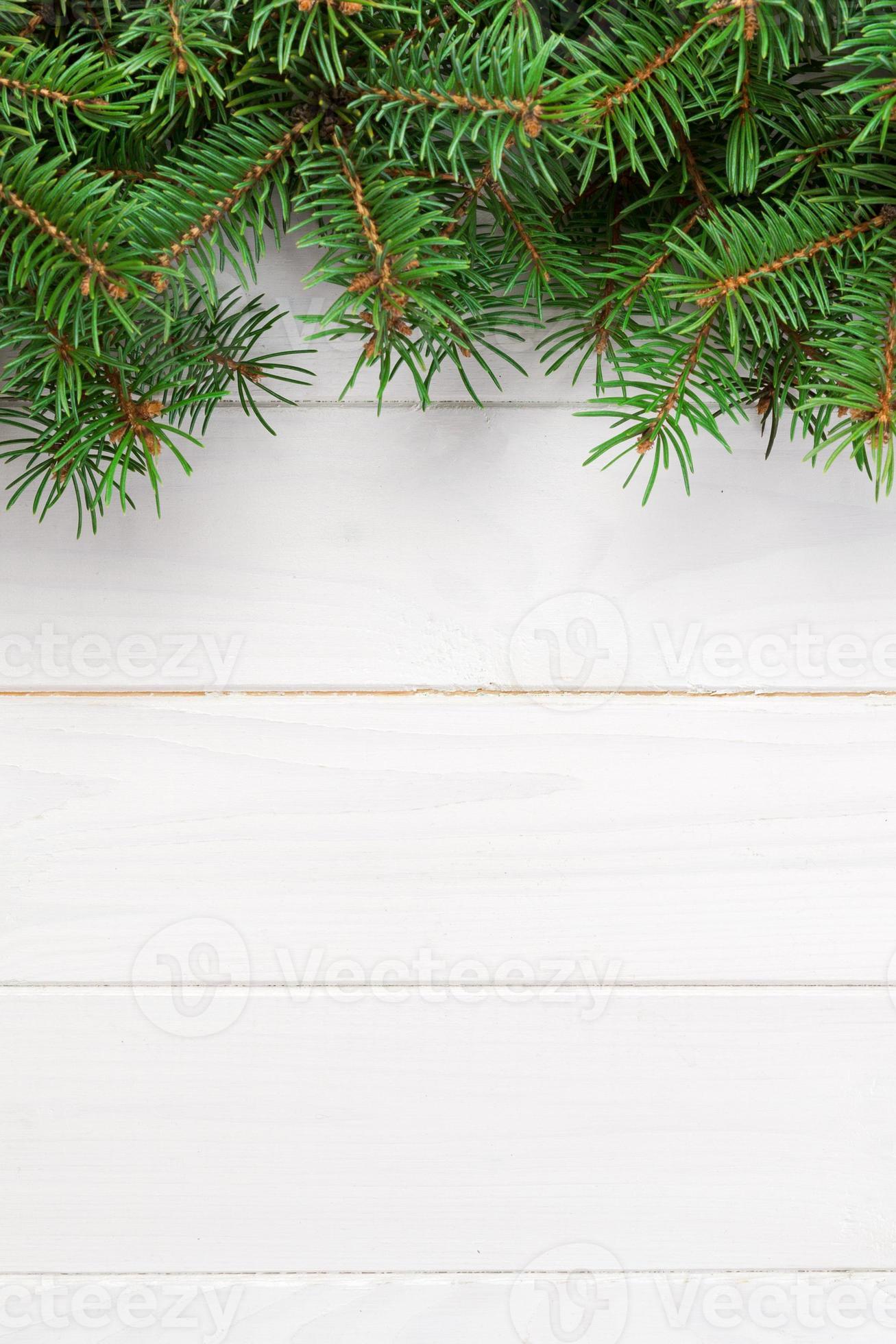 Christmas wooden background with fir tree. Top view with copy space for ...