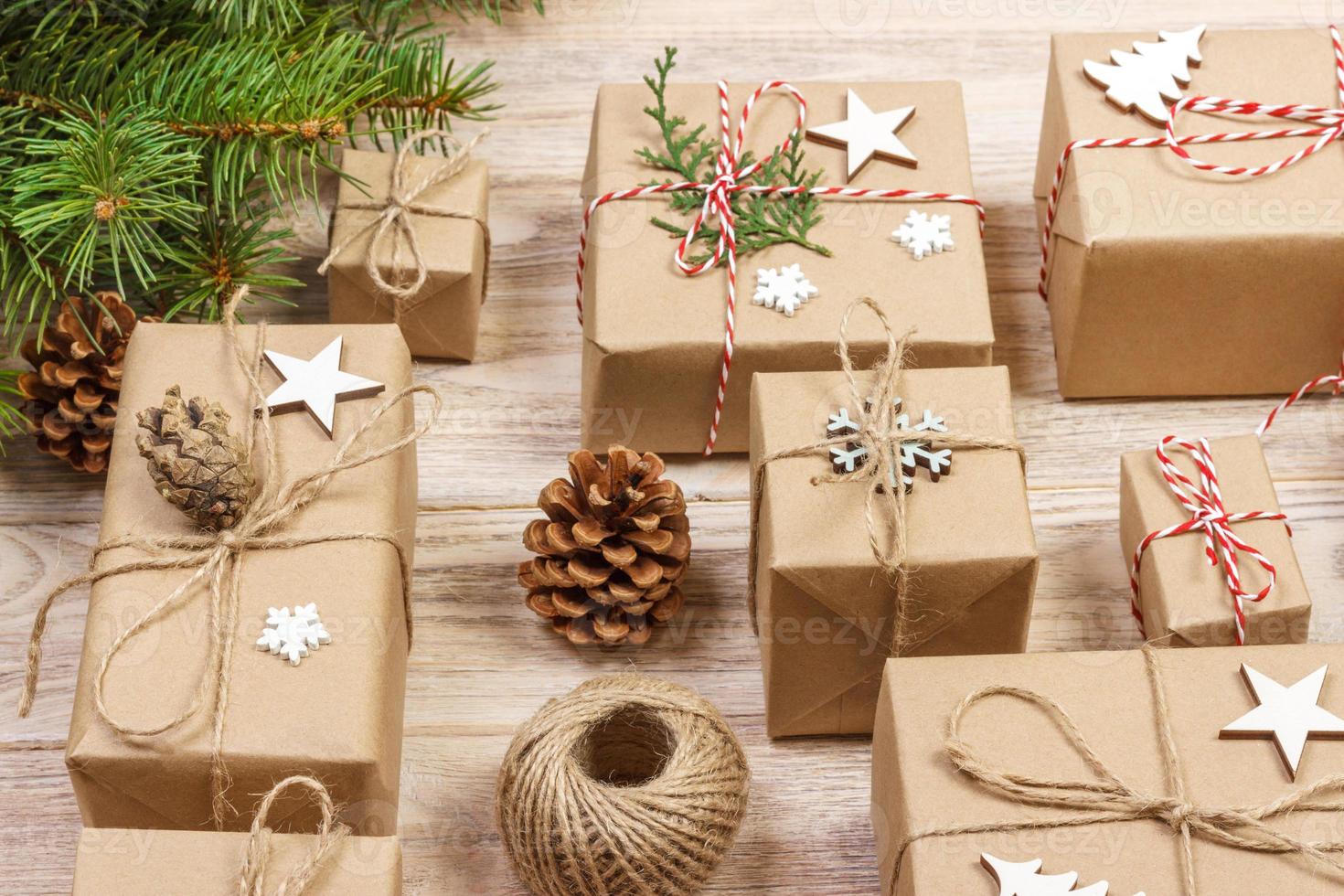 Christmas composition. christmas gifts with pine branches and christmas decoration on white background. Flat lay, top view, copy space photo