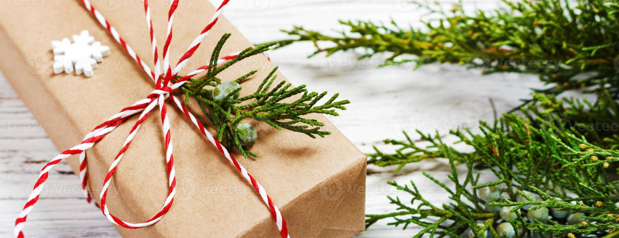 Christmas or New Year background, plain composition made of Xmas decorations and fir branches, flat lay photo