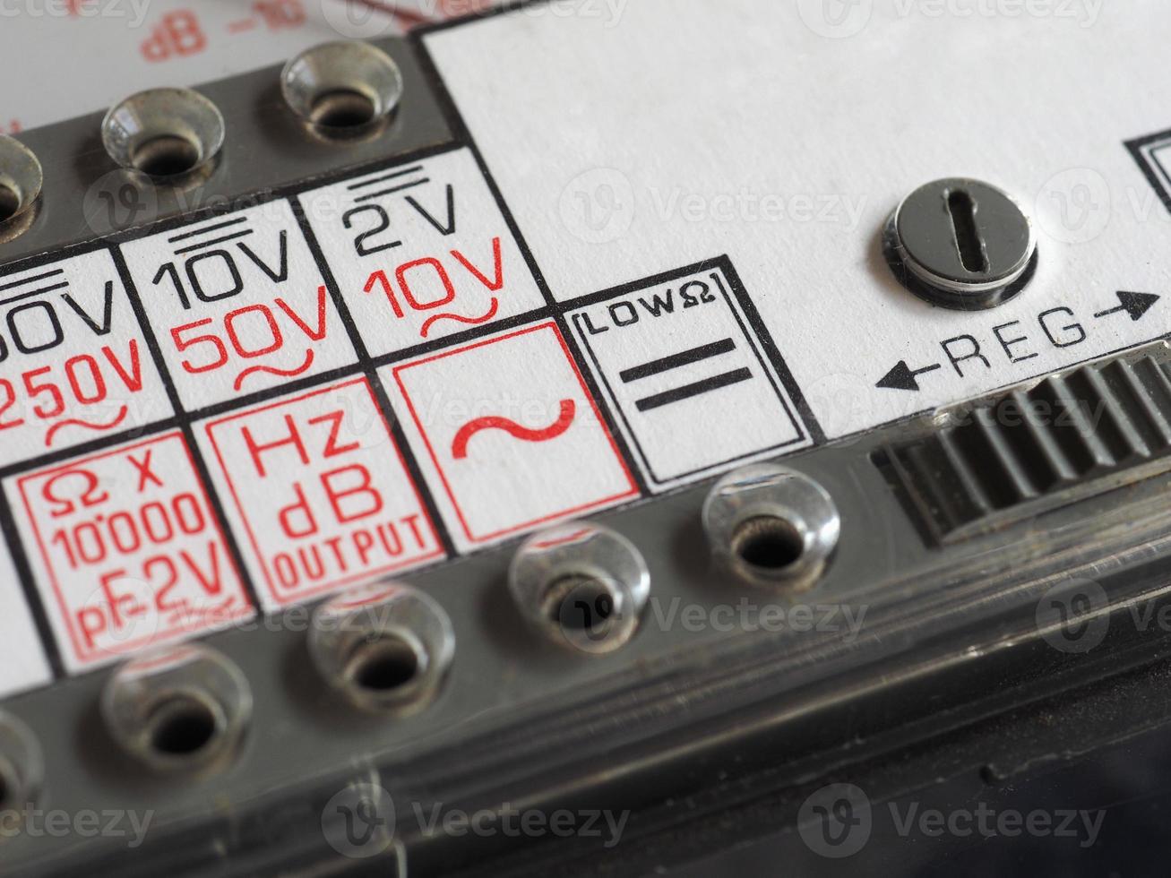 electrical symbol on vintage analog multimeter photo