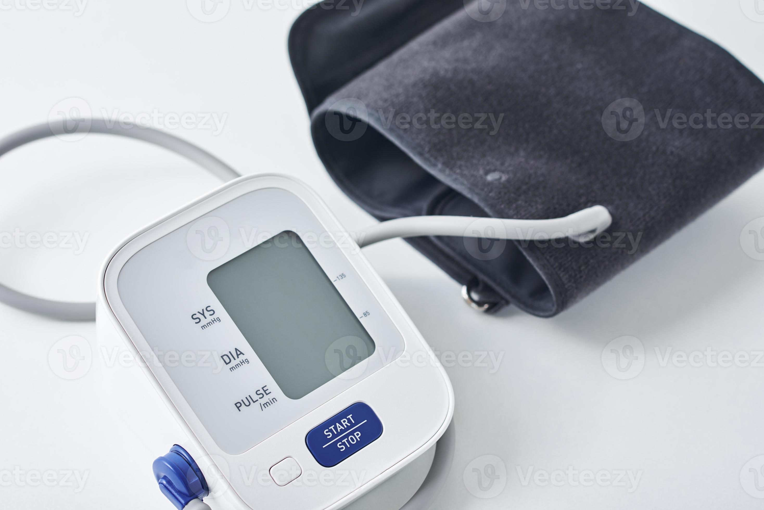 Digital blood pressure monitor on the table, closeup 14264217 Stock