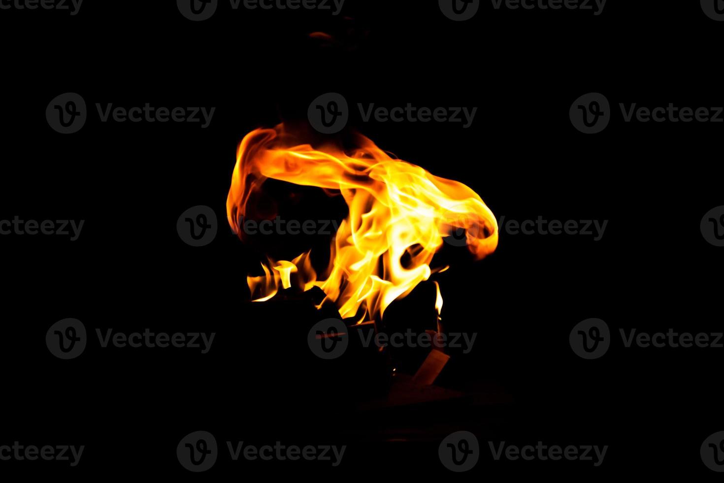 Fire flame texture. Burning material backdrop. Burn effect pattern. Blaze and torch wallpaper. Heat and haze backdrop. photo