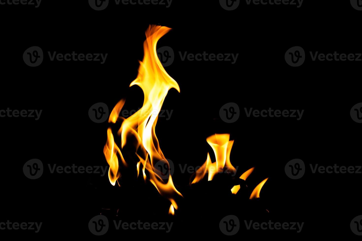 Fire flame texture. Burning material backdrop. Burn effect pattern. Blaze and torch wallpaper. Heat and haze backdrop. photo