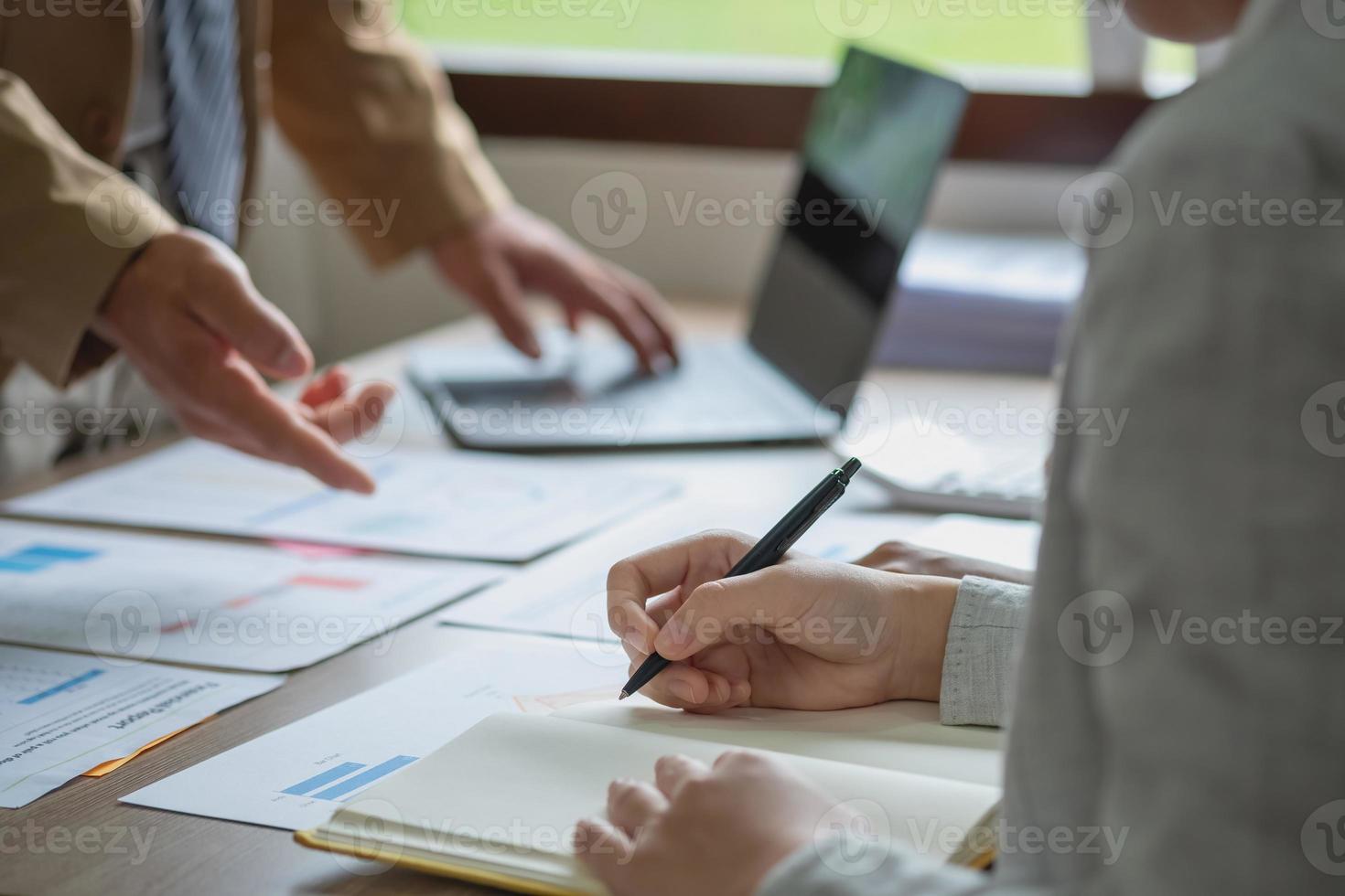 Marketing, Finance, Accounting, Planning, The company is team of marketers analyzes the company is profits using laptop computer graphs and calculators and tablet.Business concept photo