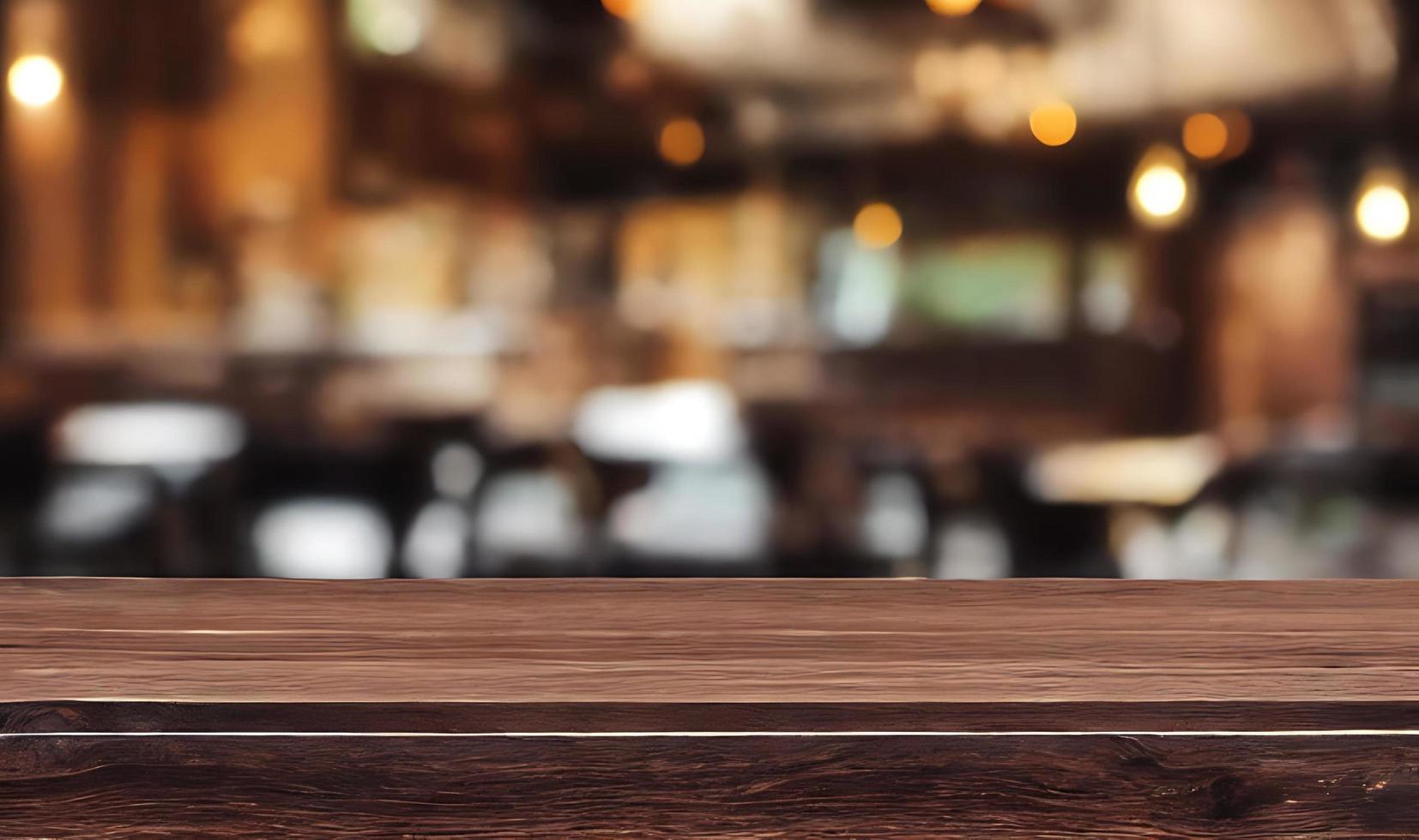 Empty wooden table in front of its background. photo