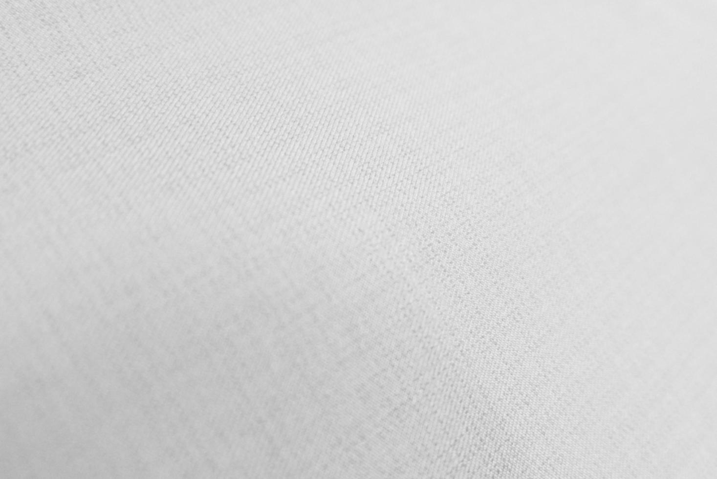 The texture of the old white fabric has a vintage dullness, there is a text area for the background, used for vintage wallpapers and designs. photo