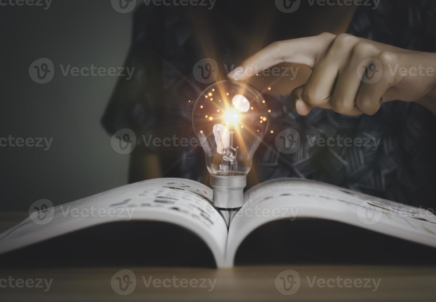 Businesswoman holding a light bulb, Creative new idea. Innovation, brainstorming, solution and inspiration concepts. imagination, creative thinking problem solving. photo