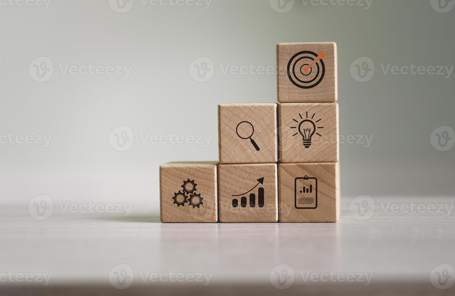Dart board, conceptualization to lead to the right goal. cube block to contain the purpose of doing business overcoming challenges Walking towards goals and winning, photo