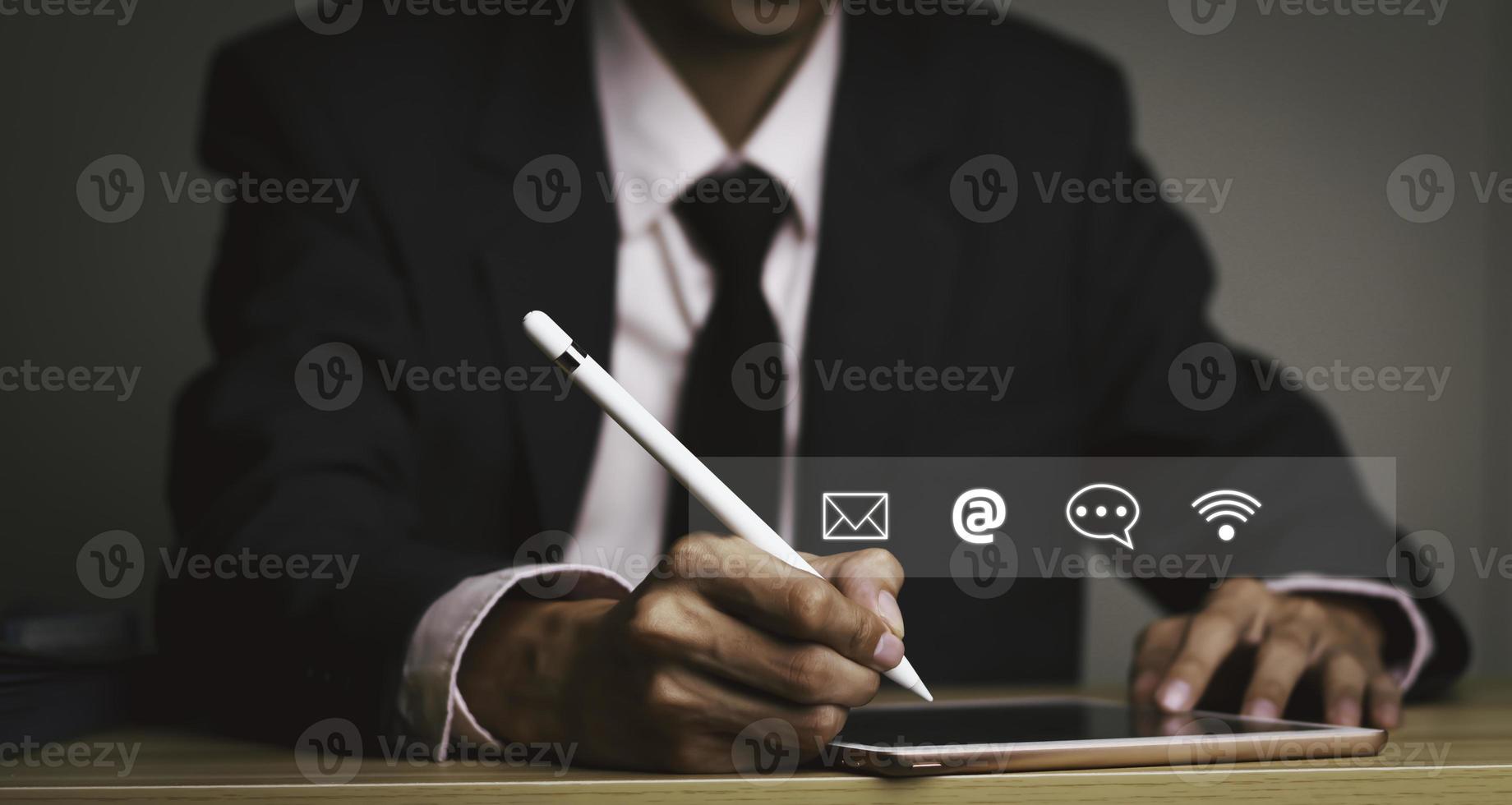Businessman using Smart Phone with Chat message Customer support hotline .check email, call phone, address, Contact us people connection in the social world photo