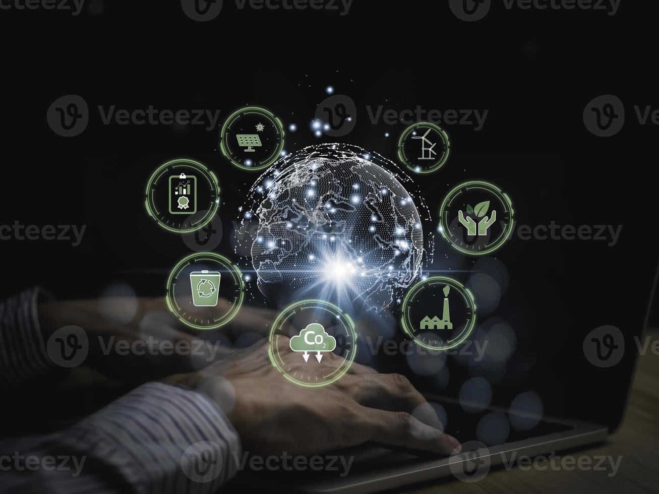 Person holding a tablet technology looking at the graph of pollution reduction or contaminants, toxic substances in industrial plants to obtain an environmental certificate.. photo