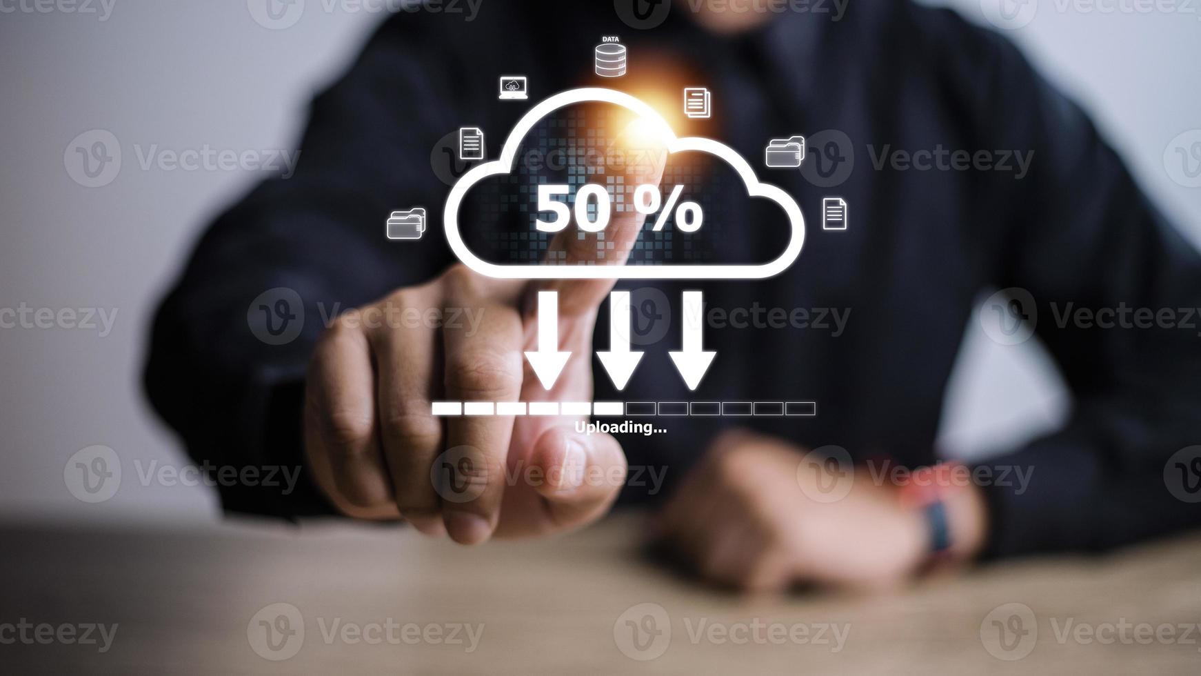 Cloud storage technology concept. Businessmen use laptops to synchronize documents or data to online storage. Upload and download files. Data sharing and transfer network. photo