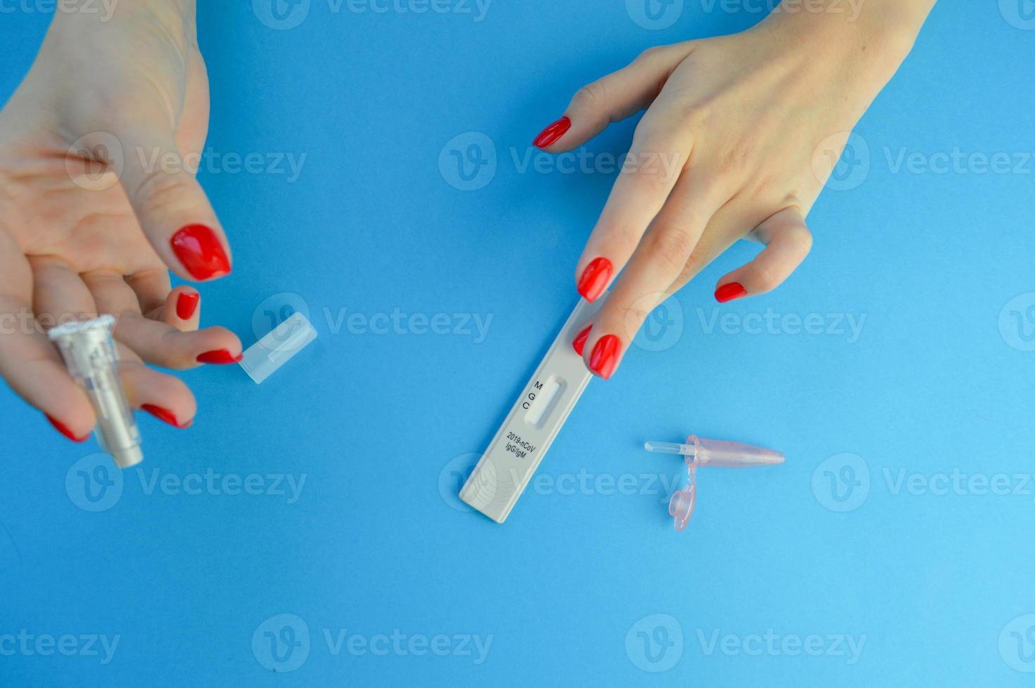 testing for coronavirus. determination of IgG and IgM antibodies. puncture of a finger with a lancet, identifying a disease in the body. infection test photo