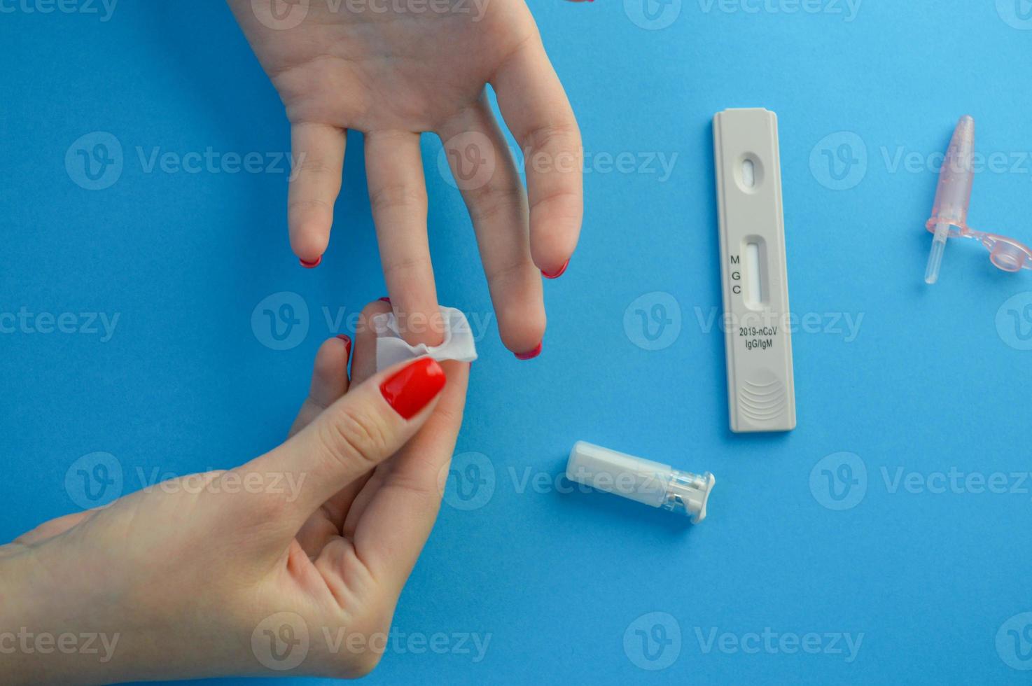 Positive test result by using rapid test for COVID-19, quick fast antibody point of care testing. Lab performing rapid diagnostic test for antibodies to detect presence of antigens COVID-19 disease photo