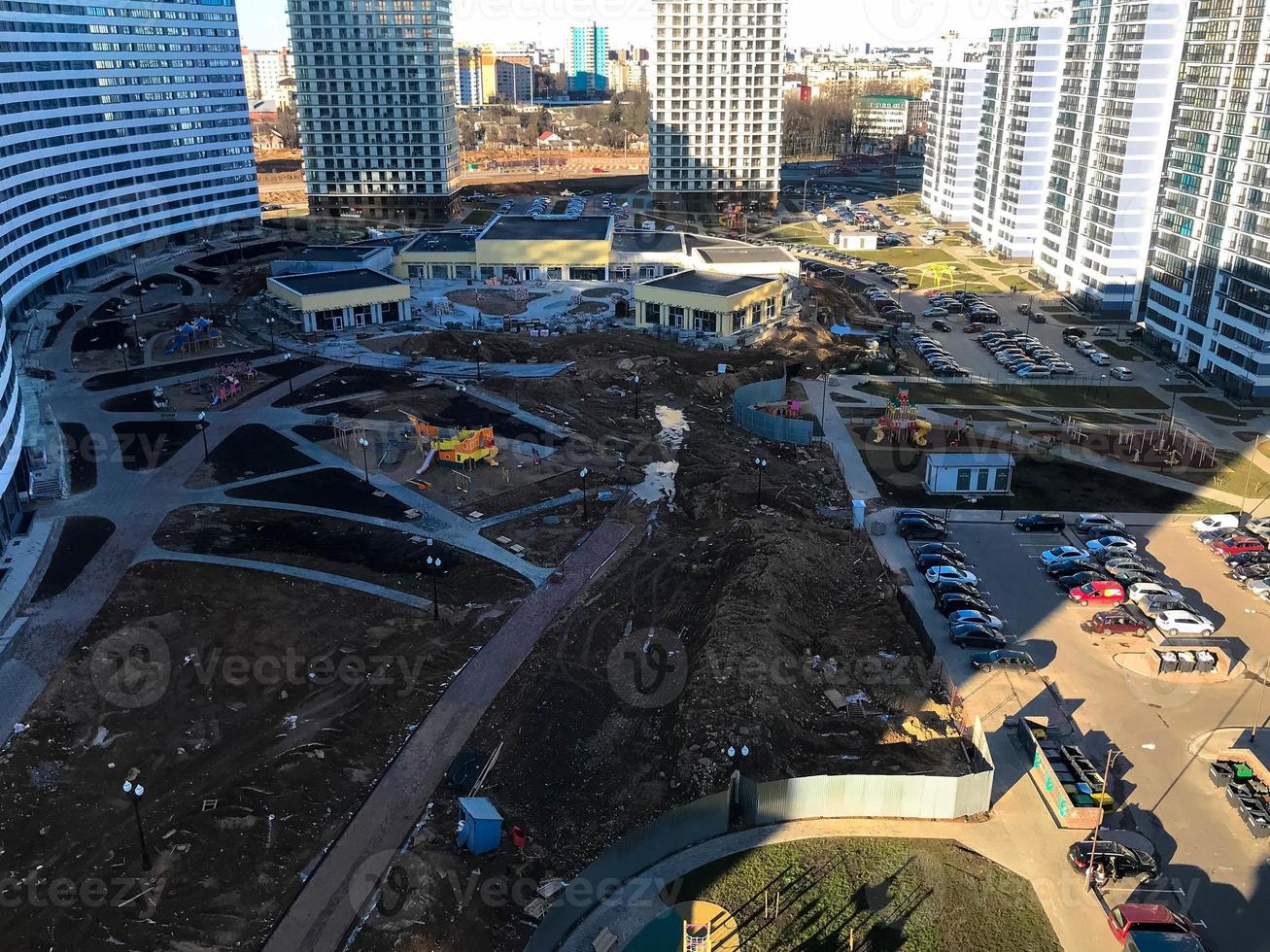 View of the new beautiful residential complex from new buildings with buildings houses monolithic concrete frame panel multi-story skyscrapers of the big city of the metropolis photo