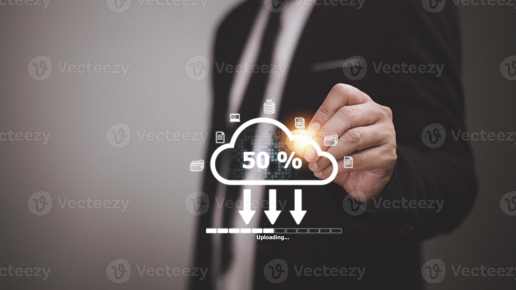 Cloud storage technology concept. Businessmen use laptops to synchronize documents or data to online storage. Upload and download files. Data sharing and transfer network. photo