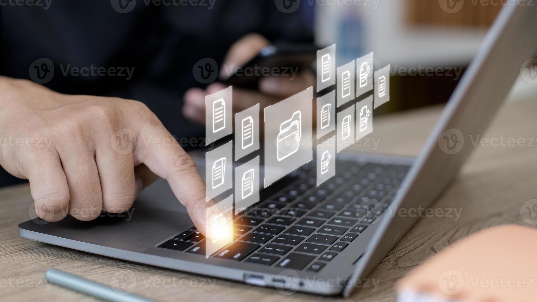 Businessman with Document Management System DMS Online Document Database and automated processes in file management Search and manage document database files online. photo