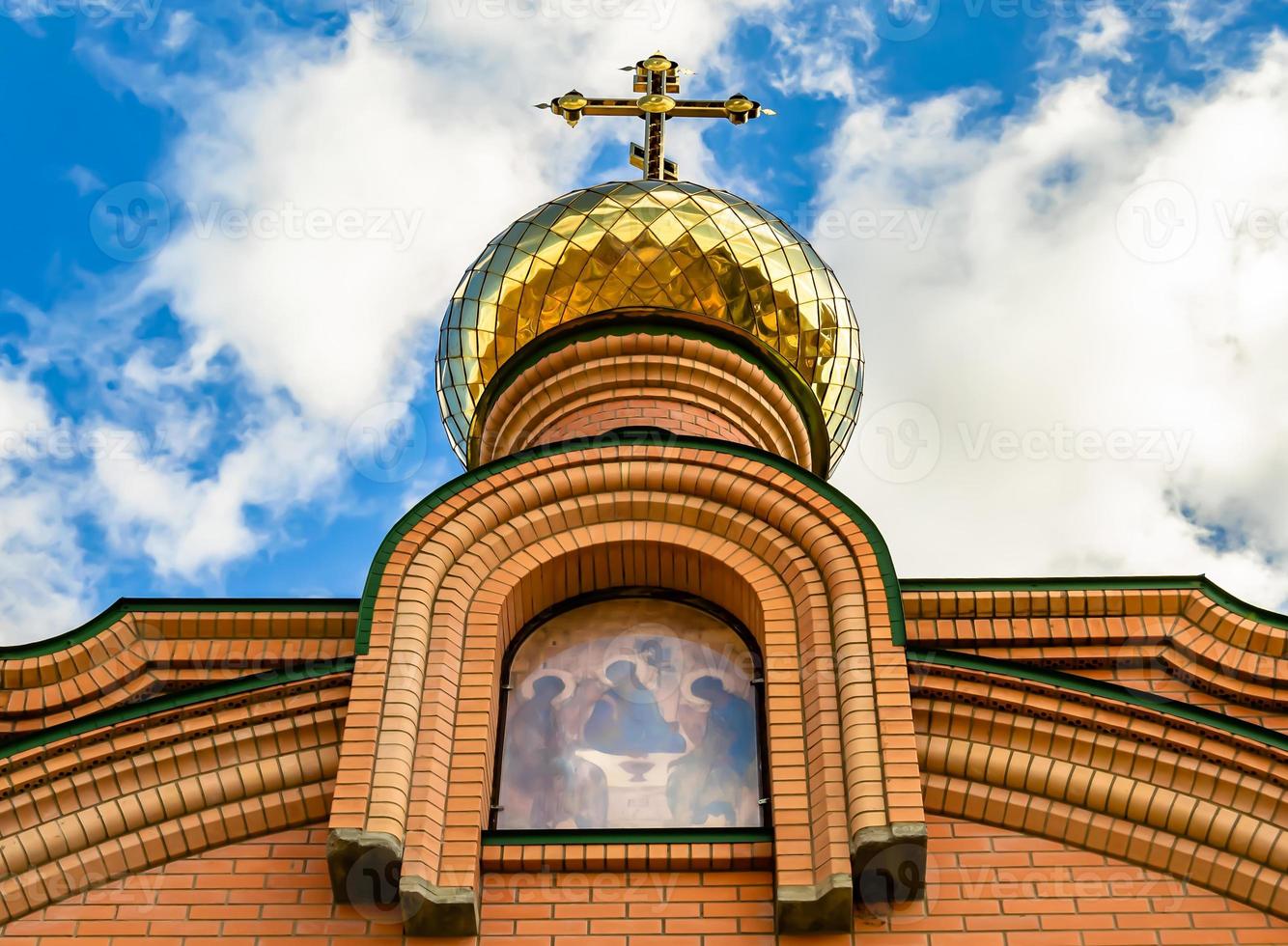 Christian church cross in high steeple tower for prayer photo