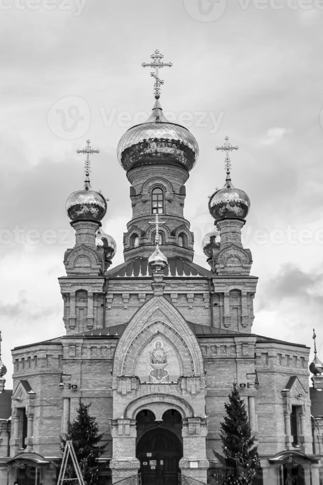 Christian church cross in high steeple tower for prayer photo