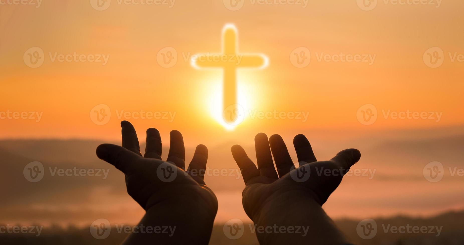 Cross is a symbol of Christianity. Human hands open palm up worship. Eucharist Therapy Bless God