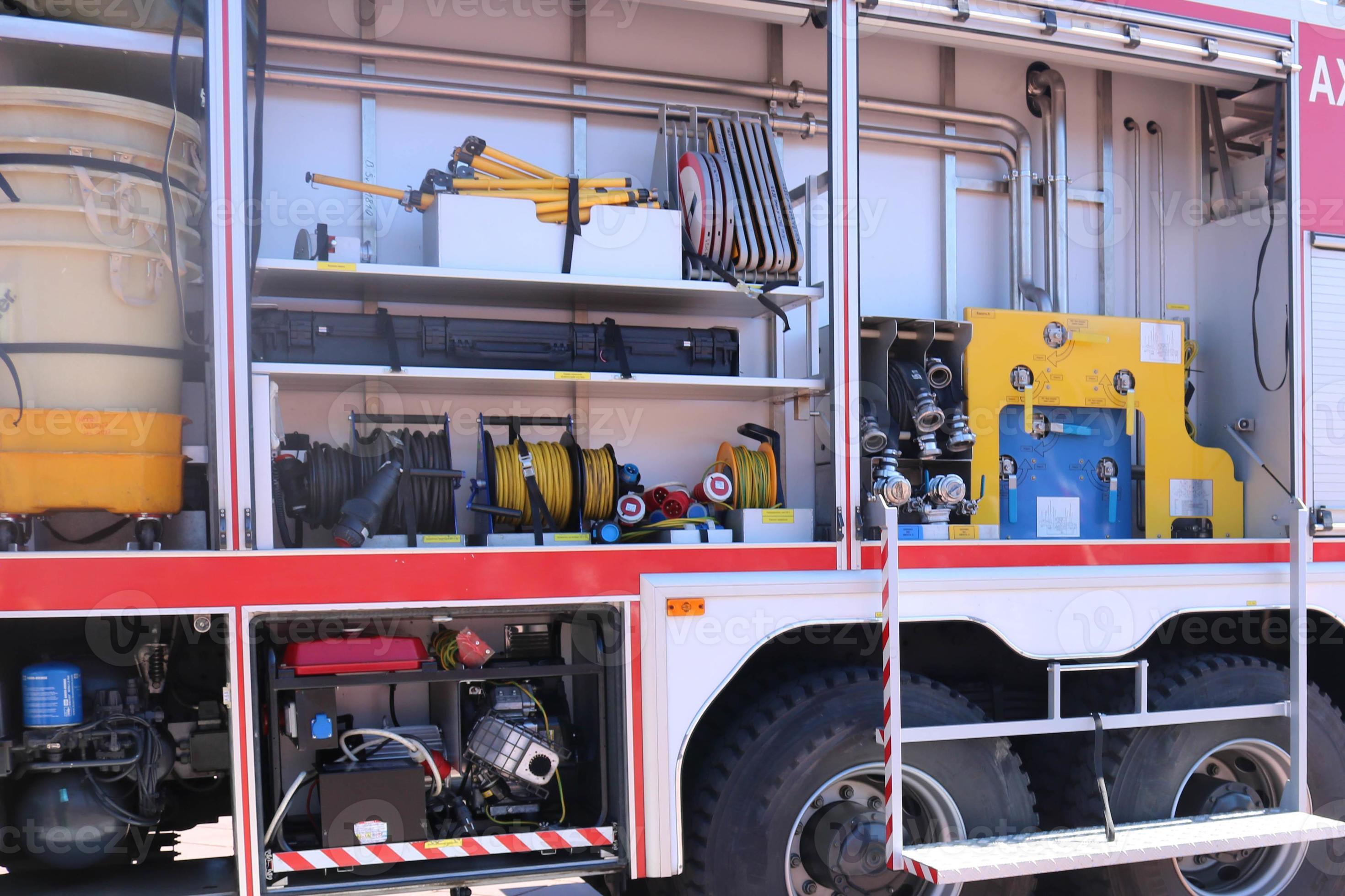 Large special red with blue fire car, engine to rescue people with open  sides and extinguishing equipment, fire pump, blowing agent, tool, water  sleeves, hoses, baloons, equipmen 14273914 Stock Photo at Vecteezy