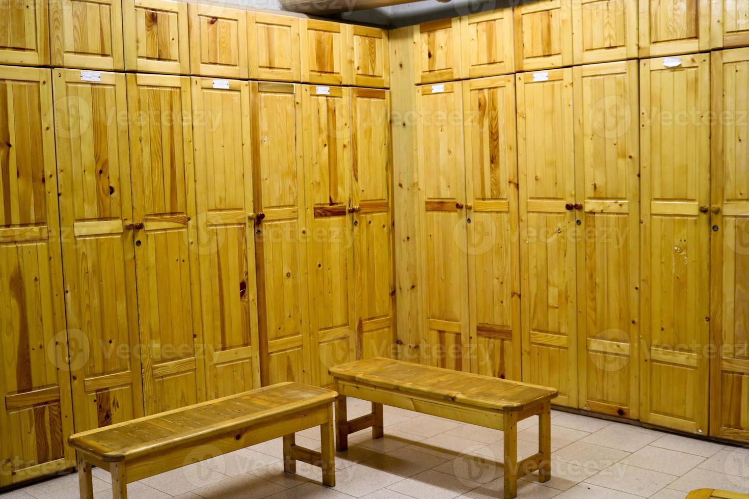 Room, locker room for workers with individual lockers for changing clothes in an industrial plant photo