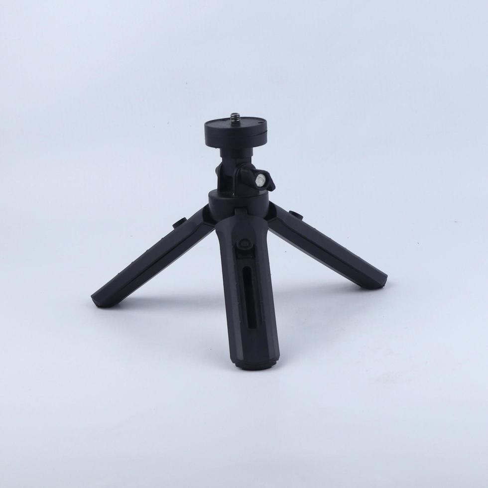 mini mobile tripod isolated on a white background photo