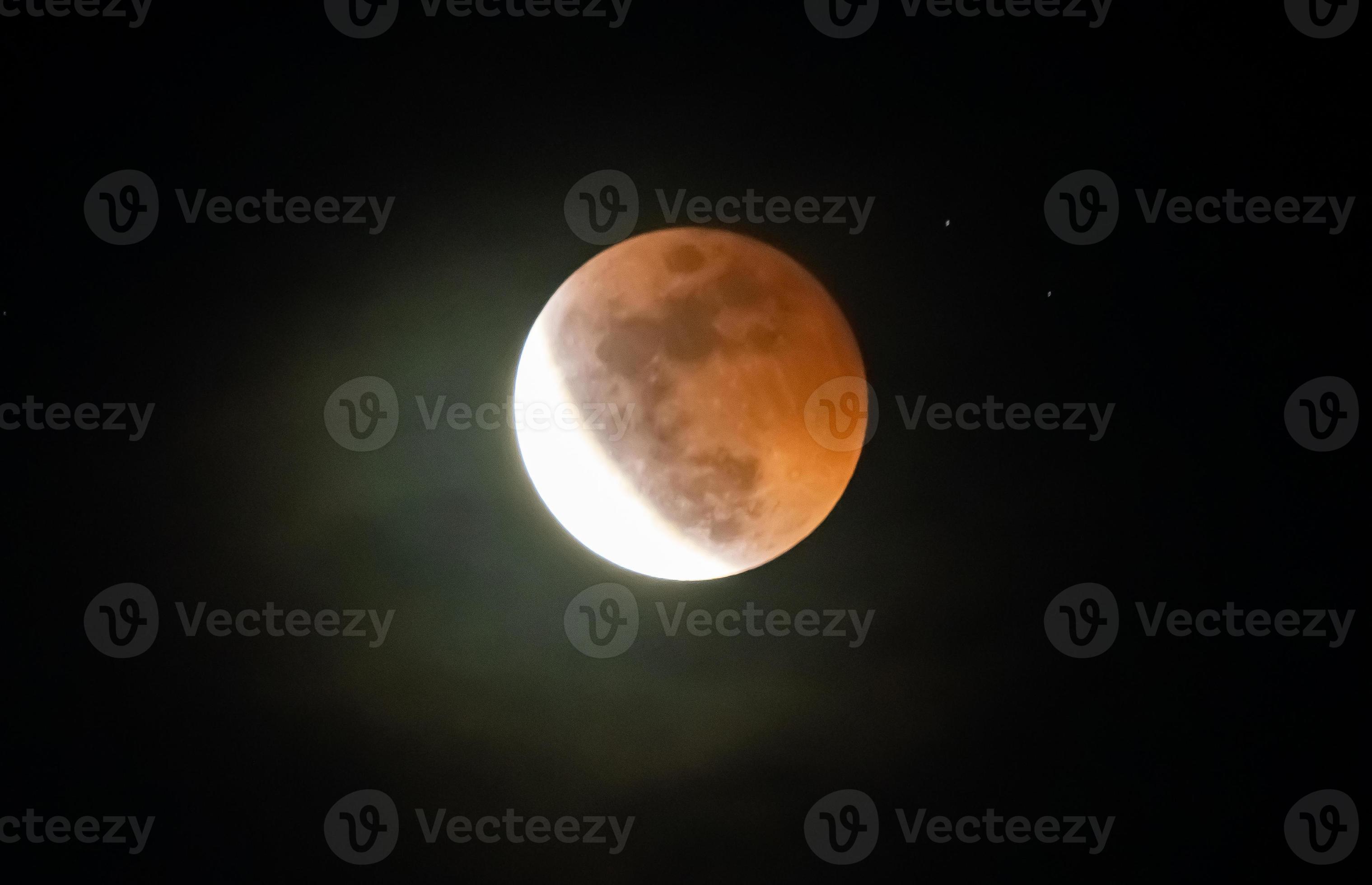 The Lunar Eclipse. Photographed blood moon 14276708 Stock Photo at Vecteezy