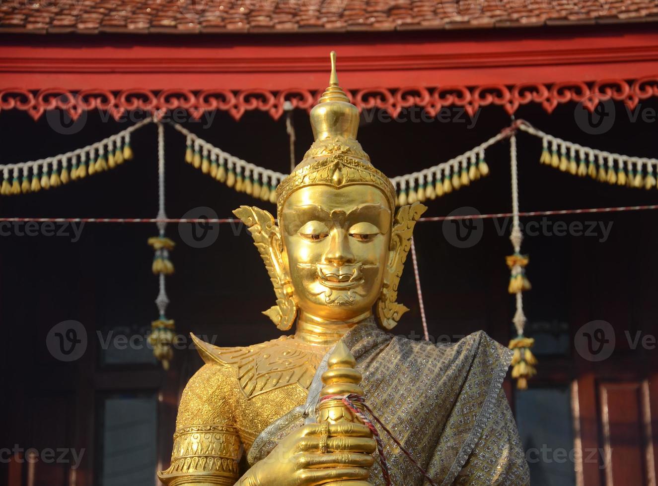 Thao Werasuwan gold color at Chulamani Temple, Samut Songkhram Province. Thailand photo